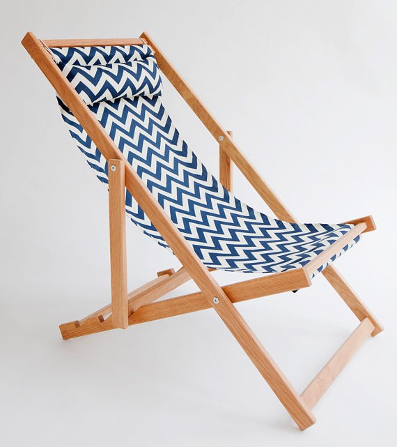 Above: A handmade Huron Deck Chair with a chevron pattern polyester sling  and frame made of North American white oak packs flat; made in Vancouver,