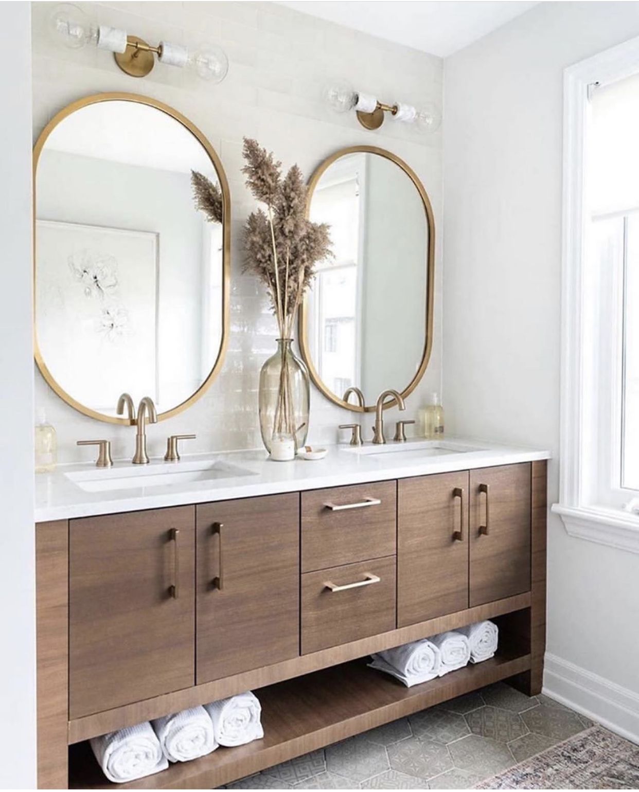 Add elegance in your bathroom with oval
mirror