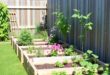 Transform Your Space: Raised Garden Beds by the Fence