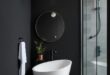 Transforming Small Bathrooms: Embracing Dark Walls for Style and Depth