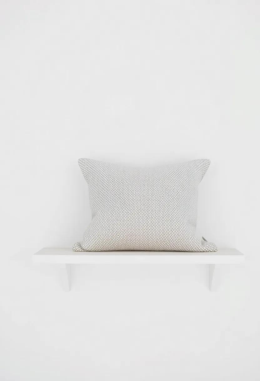 Display a single ‍textured⁣ throw pillow atop a shelf for a cozy yet understated ‍pop ⁤of comfort